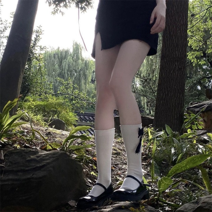 Fringed Embroidered Butterfly Calf Socks โ Black & White | Stylish Tassel Design