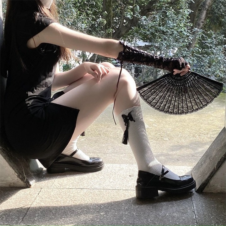 Fringed Embroidered Butterfly Calf Socks โ Black & White | Stylish Tassel Design
