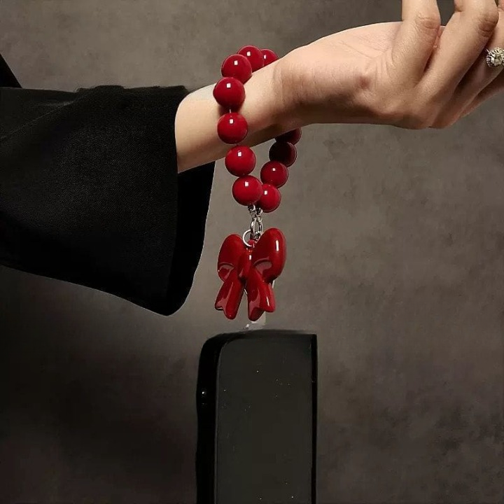 Luxury Black Phone Case with Red Bow Beaded Hand Strap – Stylish & Protective
