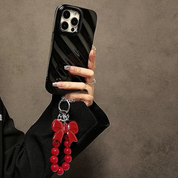 Luxury Black Phone Case with Red Bow Beaded Hand Strap – Stylish & Protective