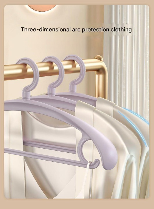 Three-dimensional arc protection clothing on a gold rack with a beige background