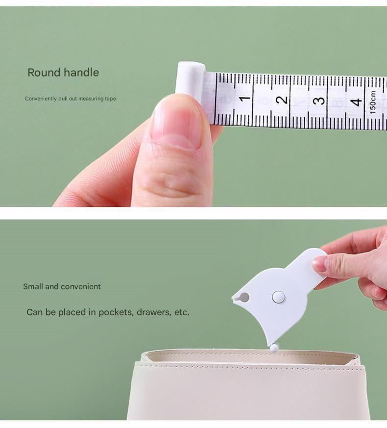 Measurement tape with round handle and small white tool for pocket use on a green background