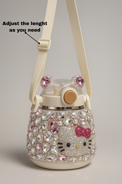 Decorative water bottle with a cat face design and embellishments on a gray background.