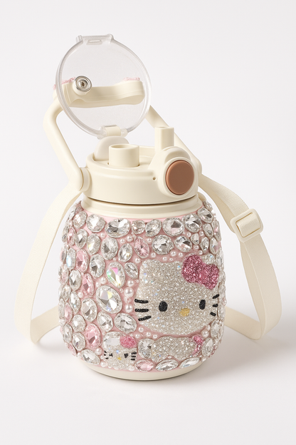 Decorative water bottle with Hello Kitty design and rhinestone embellishments on a white background