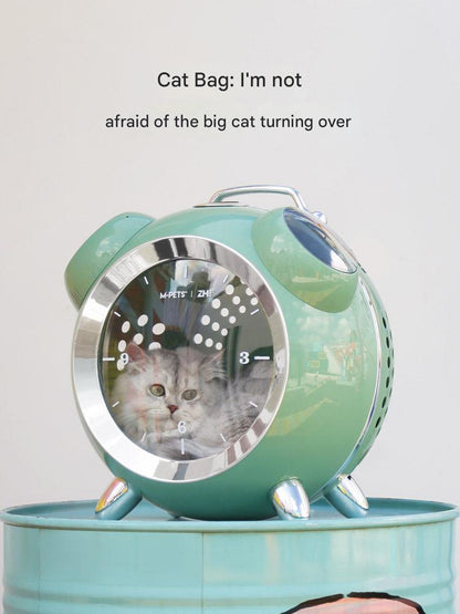 Pet carrier with a cat inside, labeled 'Cat Bag: I'm not afraid of the big cat turning over'.