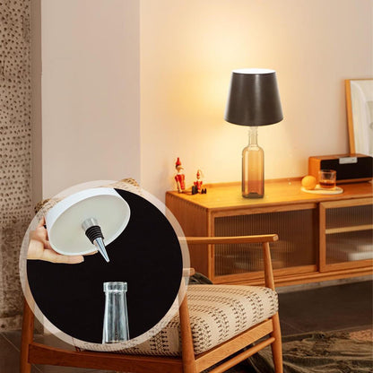 Round mirror with a black and white design on a chair in a room with a lamp and cabinet.