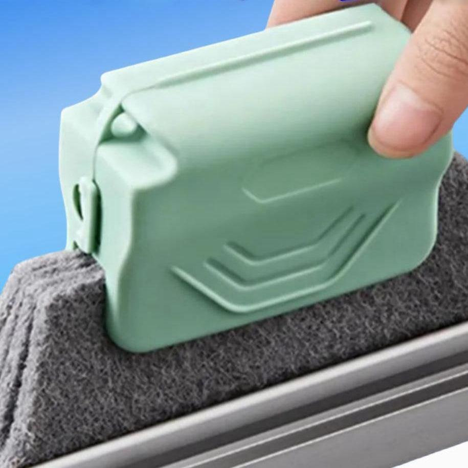 Green window cleaning tool being used on a window seal with text 'The window seams are clean'.