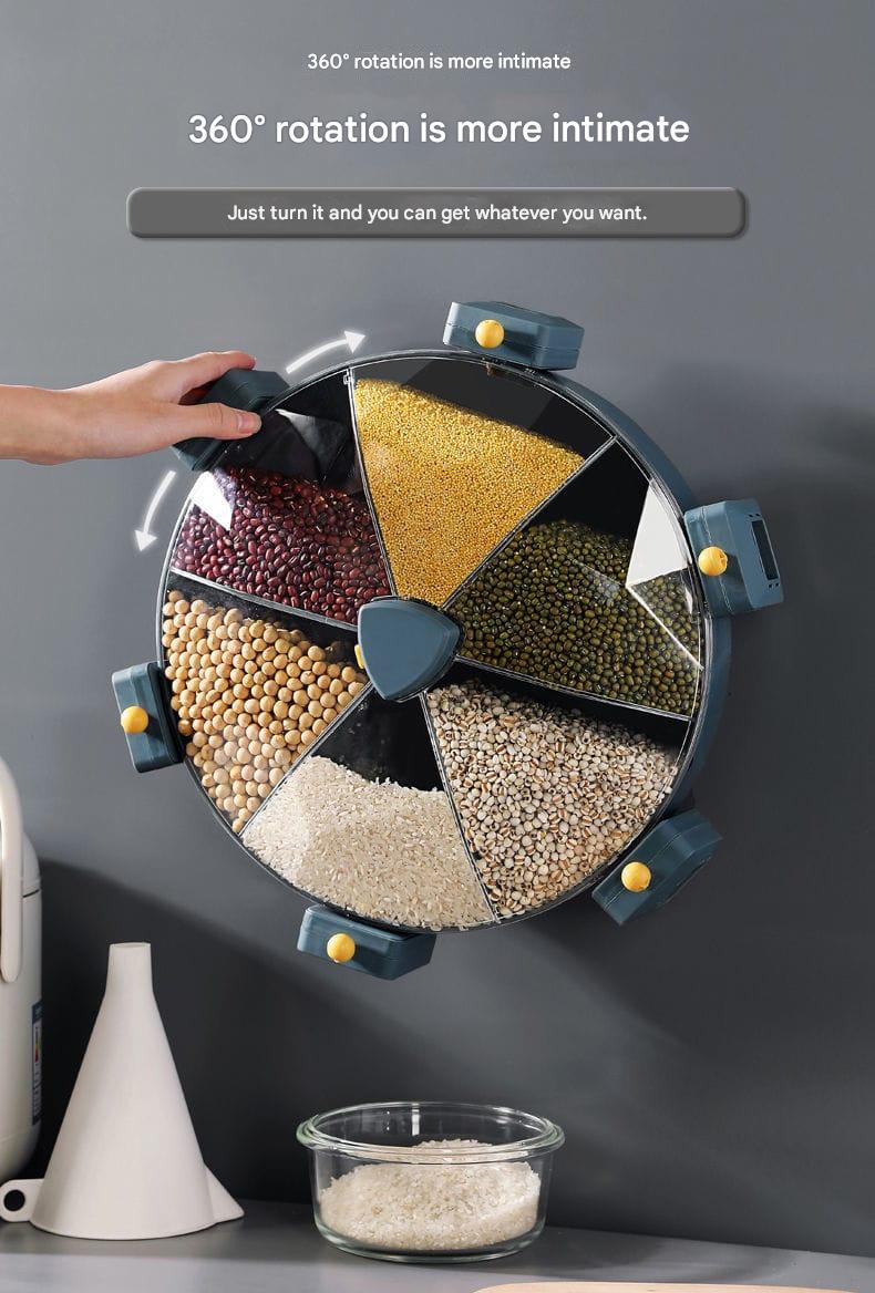 Spinning container with various grains and a hand interacting with it on a gray background.