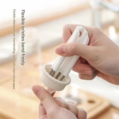 Hand holding a flexible cleaning brush with text on a blurred background