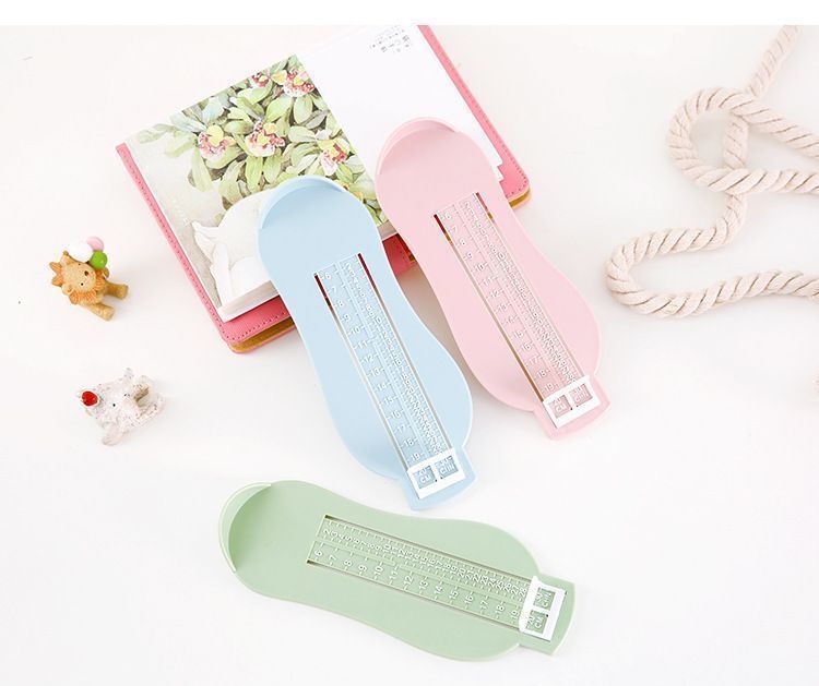 Three pastel-colored hair clips on a white background