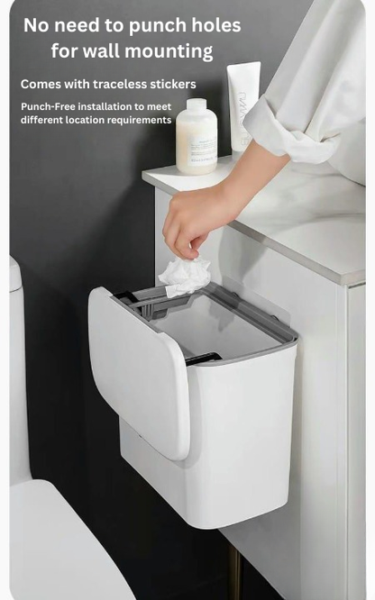 Wall-mounted trash bin with a person using it, featuring text about punch-free installation.