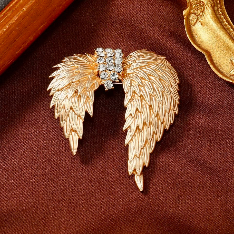 Celestial Gold Wing Brooch – Regal Crystal-Embellished Angel Wings in Dull Gold Finish | Luxury Statement Brooch for Distinguished Styling