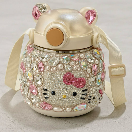 Decorative water bottle with gemstones and a bow on a light background